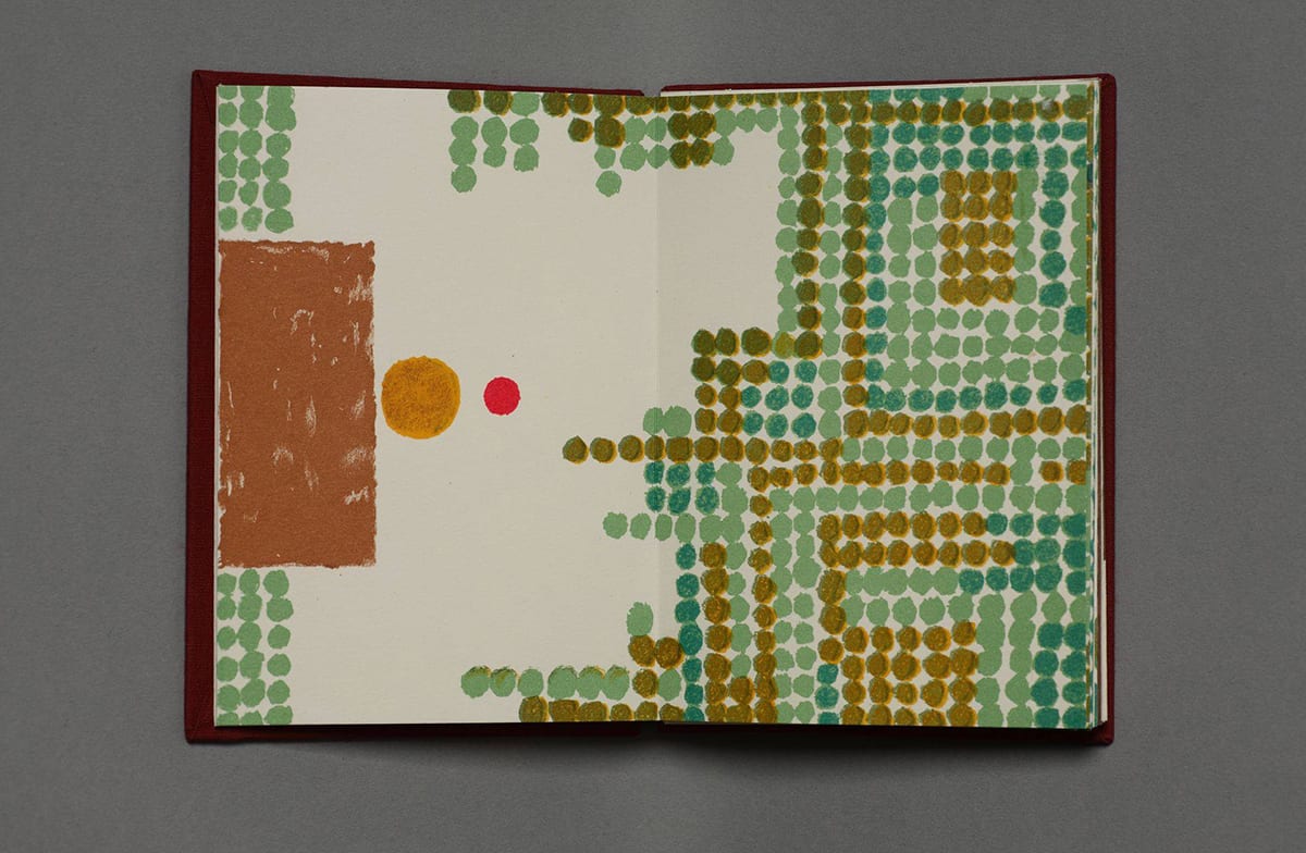 An open book with an image representing the beginning of the story. On the left page, a large vertical brown rectangle (house) sits flush with the left edge with rows of green dots (forest) above and below it. At the right of the brown rectangle is a large mustard yellow dot (grandmother). To the right of this is a much smaller red dot (Little Red Riding Hood). The area surrounding the character dots is mostly blank white page. The page on the right side is filled with green dots (forest) lined up in rows and they begin to encroach onto the page at left. They are of various hues of green from teal to sage to olive green. The different hues form geometric shapes and lines within the page. 