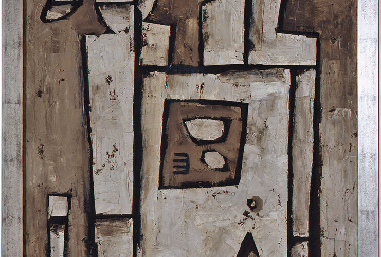 Two Figures with Still Life, Gonzalo Fonseca, 49 1/8 x 35 inches, oil on burlap. A vertical, rectangular painting representing two, geometric, abstract figures. The boxy figures take up most of the painting which is rendered in tones of gray with black outlining. The figure at left has a circle for a head with a small crescent shape positioned just to its left. Squared off shoulders lead into a rectangular body that disappears behind another tall rectangle in front of it. A thin, upright rectangle is positioned separately near the bottom left. At right, another figure has a boxy head and uneven square shoulders with a slim bit of straight body visible behind the rectangle in front of it. That rectangle has a triangular chunk taken out of its lower portion, perhaps suggesting a table leg. A dark gray, slanted square is positioned in its upper portion and contains three small abstract shapes. The figures and the table representation are a pale gray with visible brushwork while the background is rendered in deeper gray.
