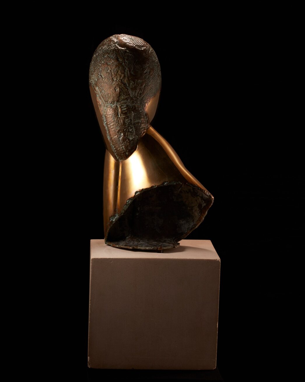 Image description: Muse, Constantin Brancusi, bronze on limestone base, 19 1/2 x 10 x 5 inches. A smooth, bronze, stylized bust of a woman’s head, elongated neck and shoulder. Front view: The woman’s egg-shaped head is smooth except for a raised V shape in the center representing the brow and finishing in a delicate nose. A small mouth is the only other feature on the face. Hair is suggested with rough, textured lines incised into the crown of the head. This texture appears darker than the glossy golden bronze face. A long neck extends from the head at left and is attached to a sloping shoulder. At right, the head seems to rest on a hand and forearm that extends to join the shoulder. The bottom edge of the sculpture has a rough and unfinished appearance. The bust rests on a gray cube of limestone that is juts a bit wider than the sculpture and about half as high. Left profile view: A smooth egg-shaped head smooth except for a small nose at the lower third of the profile. An simple C shaped ear is positioned below the textured hair. A gracefully shaped neck extends forward from a wedge-shaped shoulder. The bronze material folds back on itself, exposing rough edges, to rest on the base. Rear view: The textured hair appears to lengthen past the shoulder area ending in a blunt point. The sculpture’s shoulders fan out into a cone like structure that opens at an angle to expose the unpolished bronze inside. Right profile view: The hand and forearm shapes are visible from this view represented by simple elongated oval shape, a crease at the wrist giving definition to the two parts.