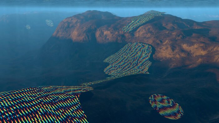 Video still of mountains, ocean, and sky with digital lines flowing over them