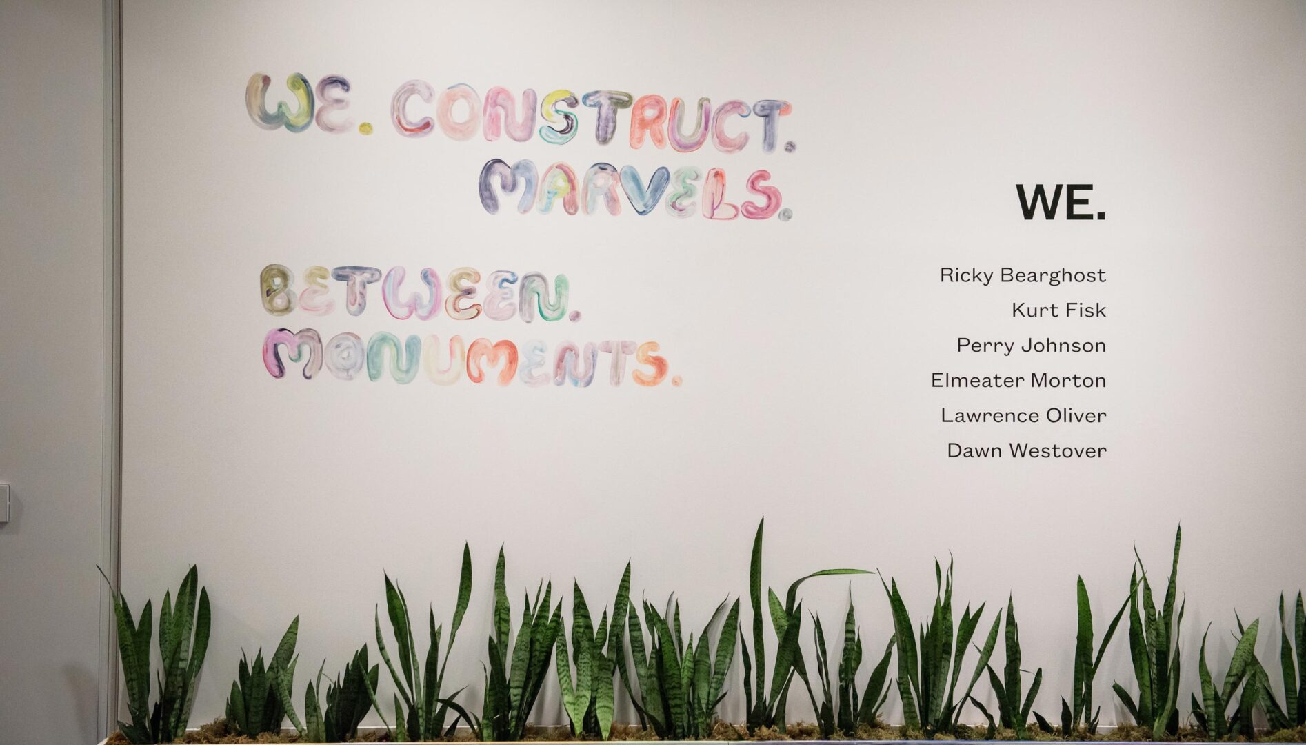 Intro panel wall for We Construct Marvels Between Monuments exhibition