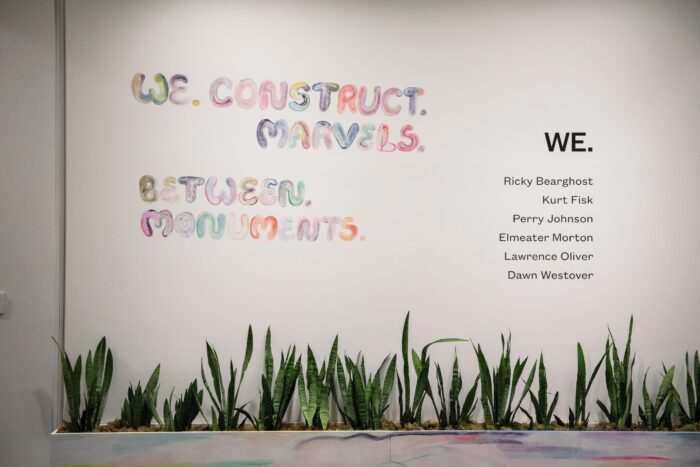 Intro panel wall for We Construct Marvels Between Monuments exhibition