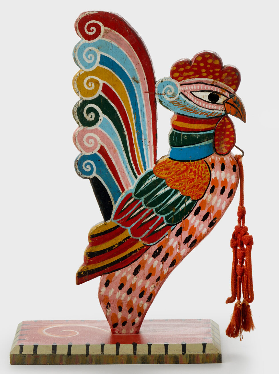 Wooden sculpture of a rooster
