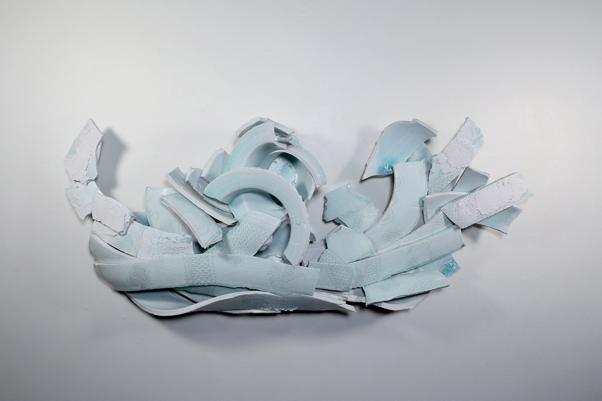 Sculpture made of porcelain, white slip, glaze, epoxy and steel.