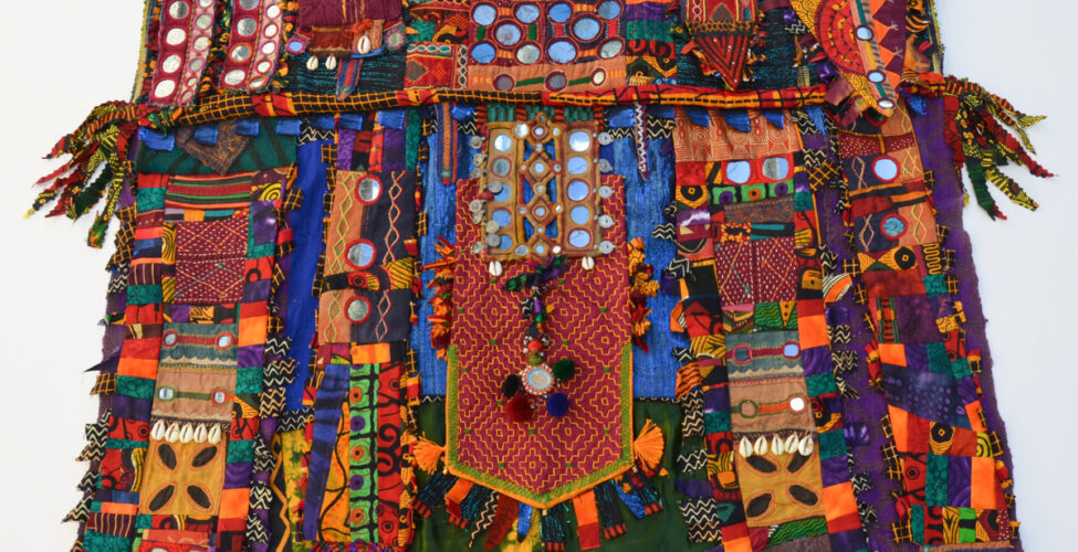 Adriene Cruz (American, born 1953), Egungun, 2013, mixed media embellished fabric, 32" x 36", Collection of Adriene Cruz