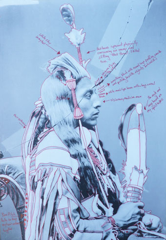 Photograph of a Native American man with red ink annotations drawn on it