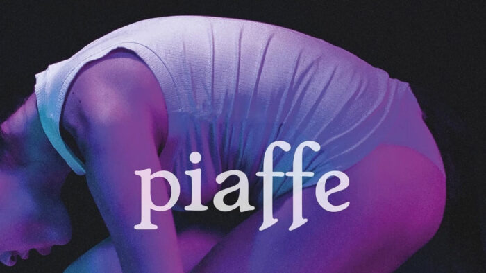 Purple tinted photo of a woman bent over with the word piaffe over the image