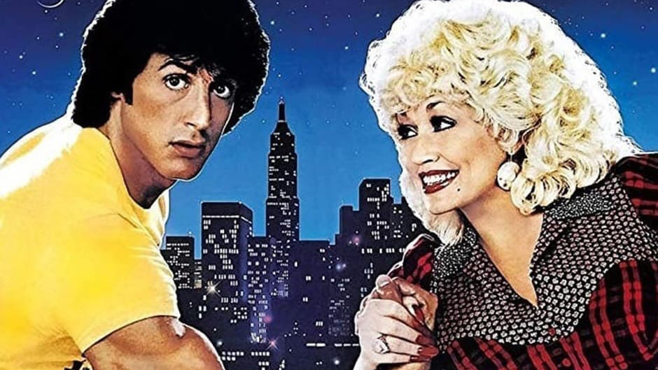 Photo of Sylvester Stallone and Dolly Parton arm wrestling in front of a cityscape