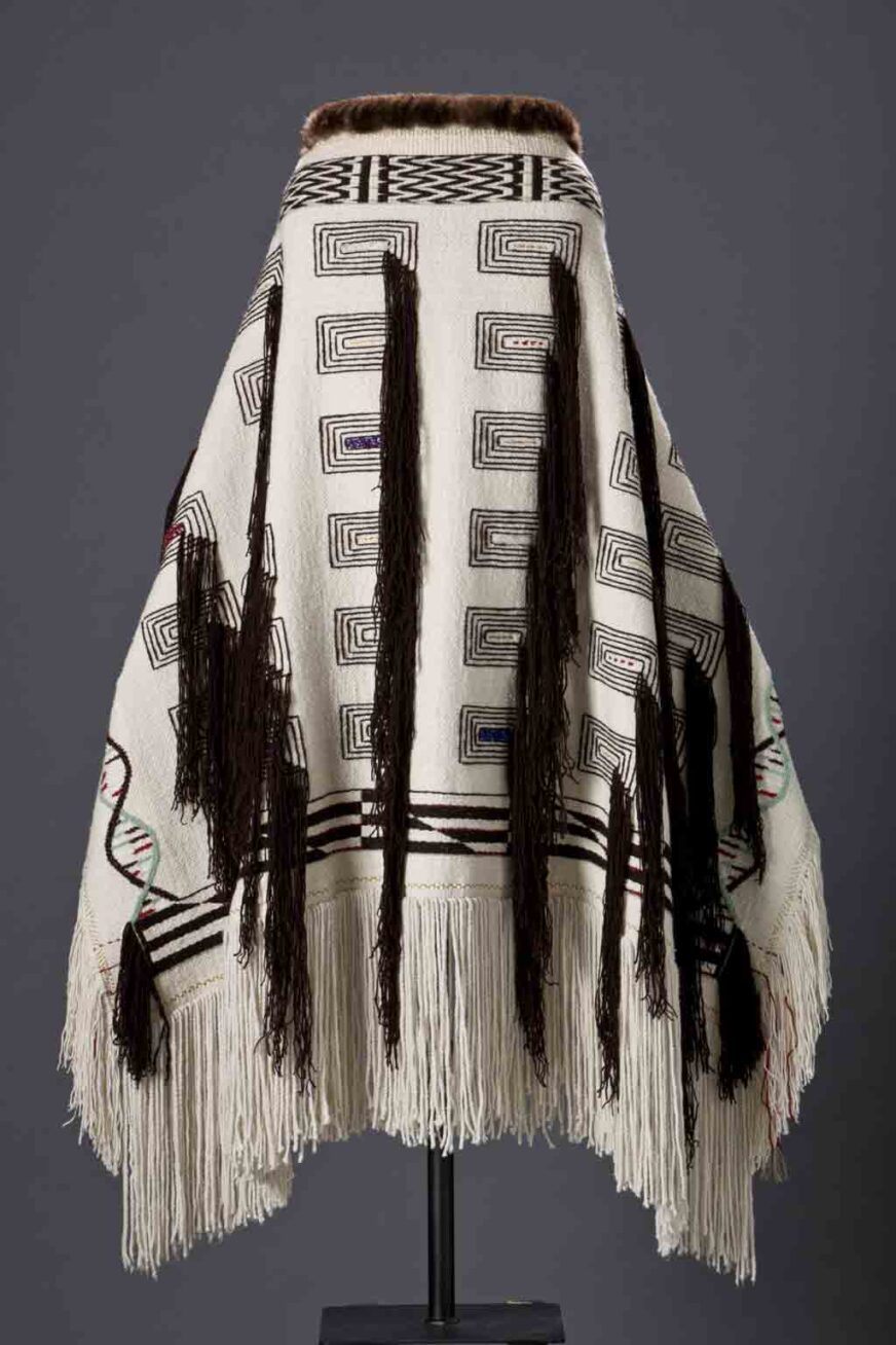 Photograph of a black and white patterned woven robe