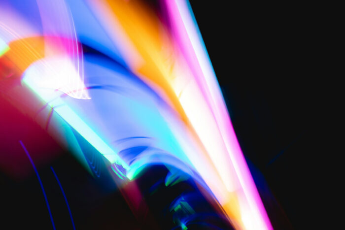 Abstract images of multicolored lights on a black background
