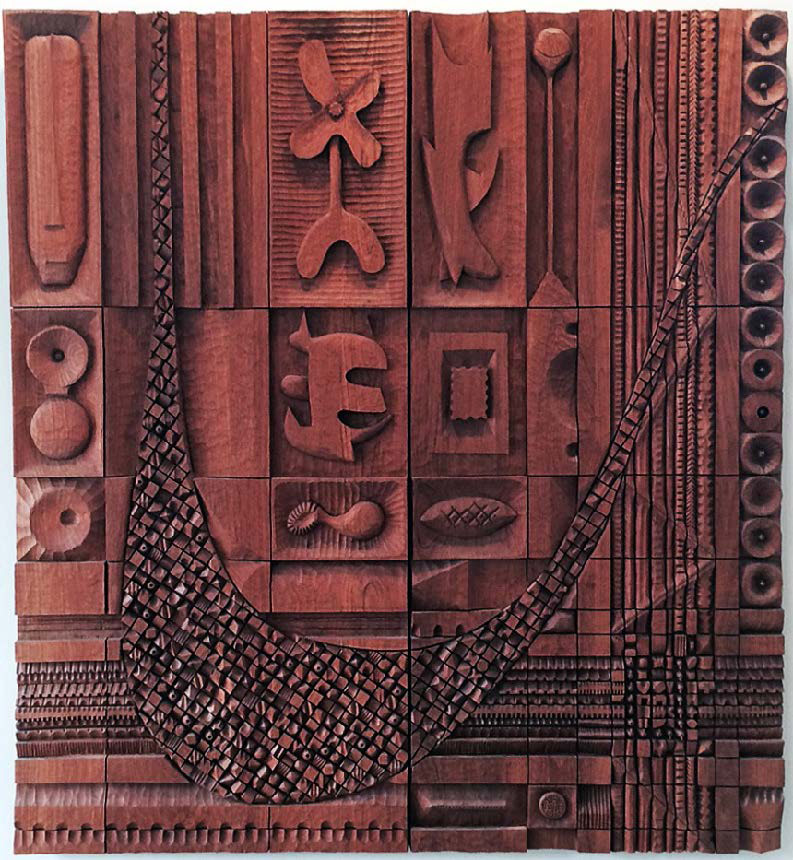 Carved wooden artwork with different abstract shapes and patterns