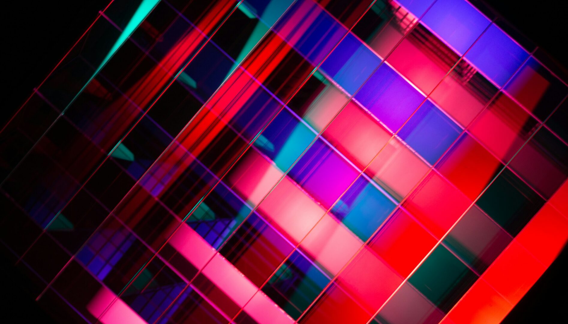 Abstract image of neon red, blue, and purple lines