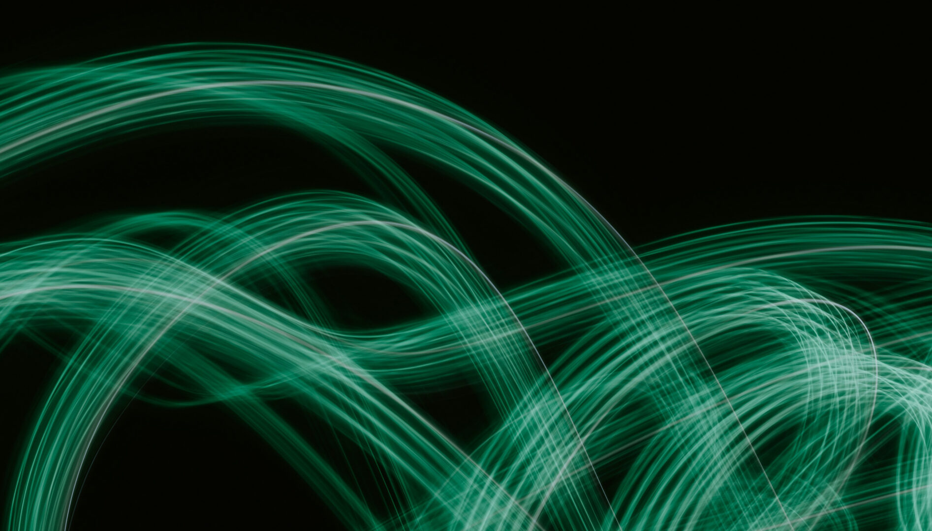 Abstract green lines on a black background