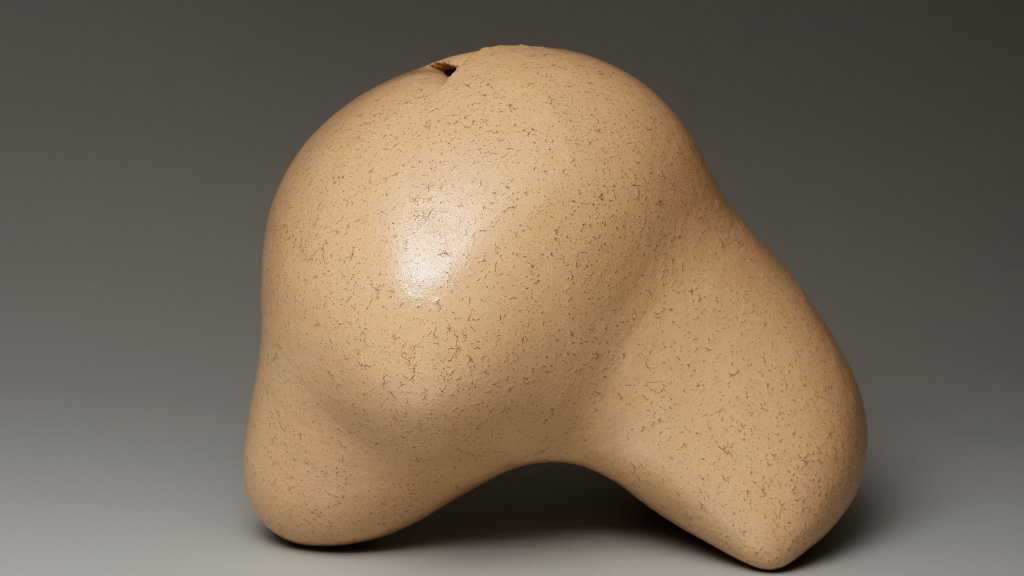 Light brown speckled ceramic sculpture