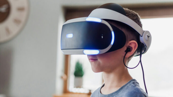 Photo of a child wearing a virtual reality headset