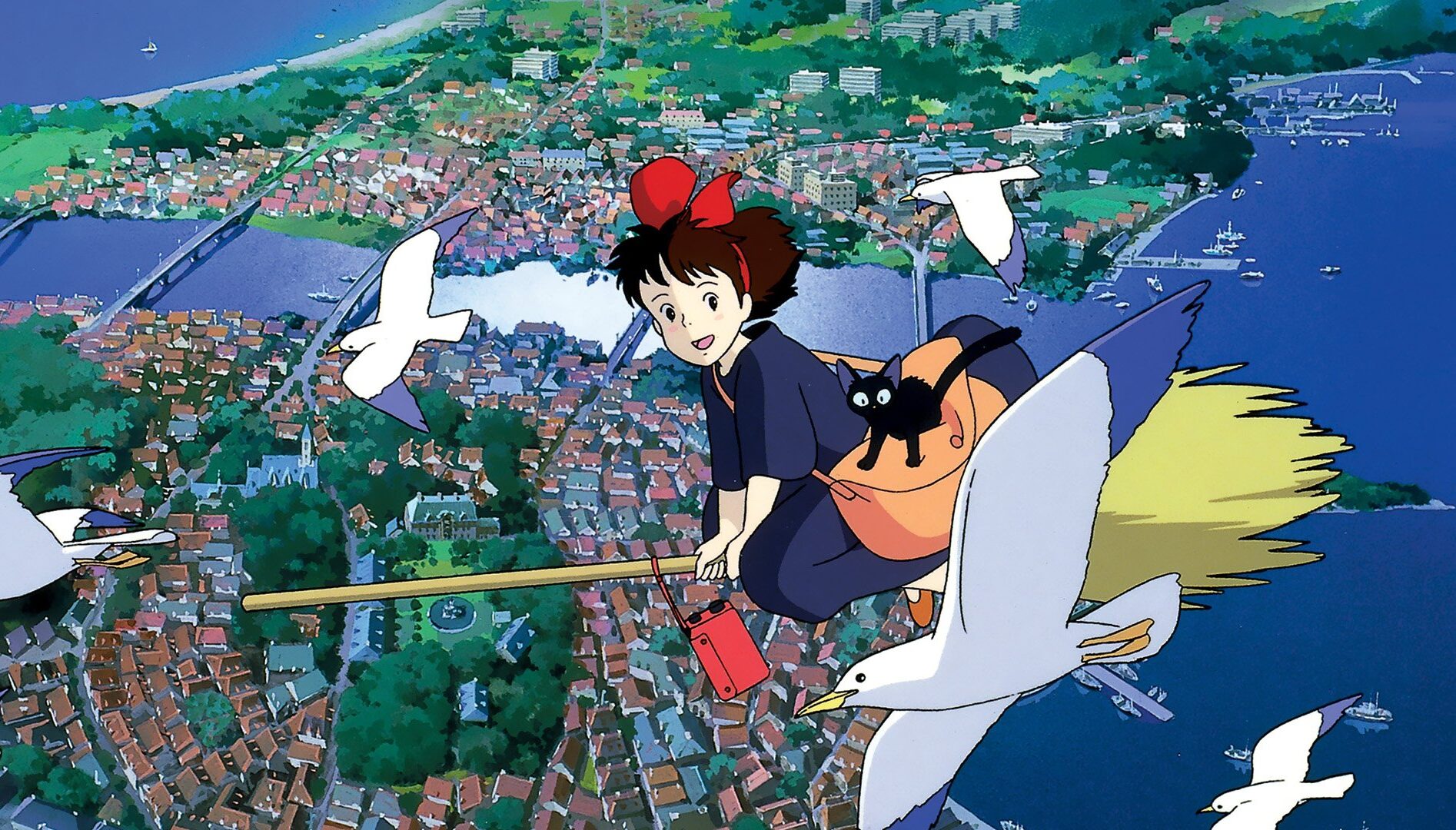 Film still of a girl riding in the air on a broomstick over a city, with birds flying to either side of her