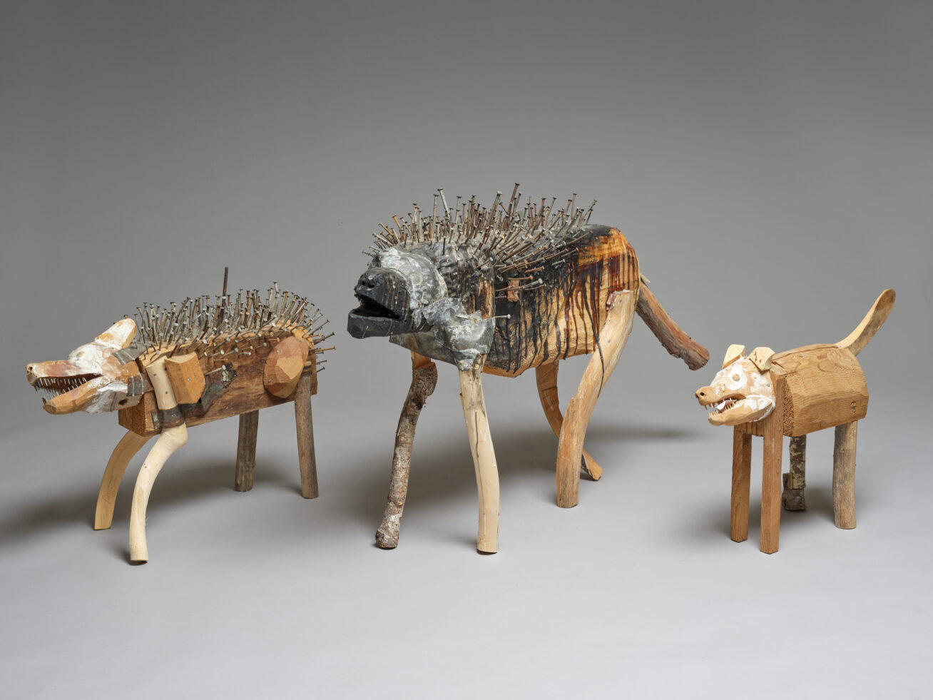 Image of three dog sculptures