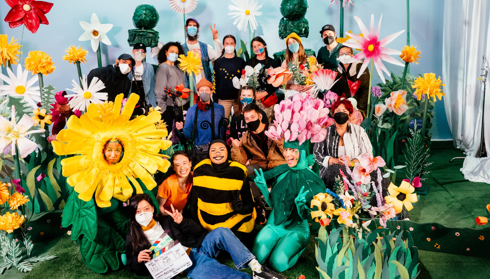 A group of people dressed like bees and flowers!