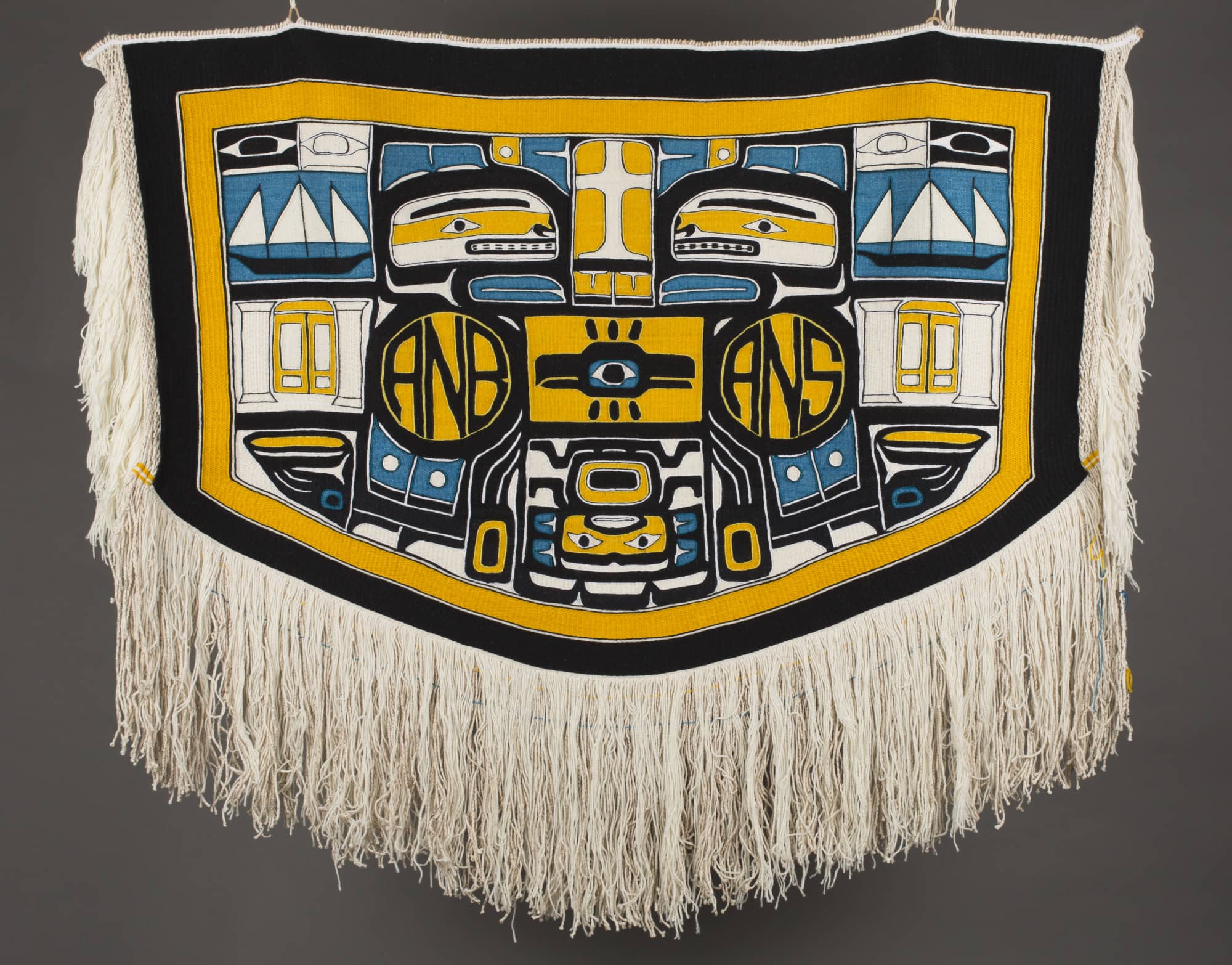 A Native American robe displayed flat.