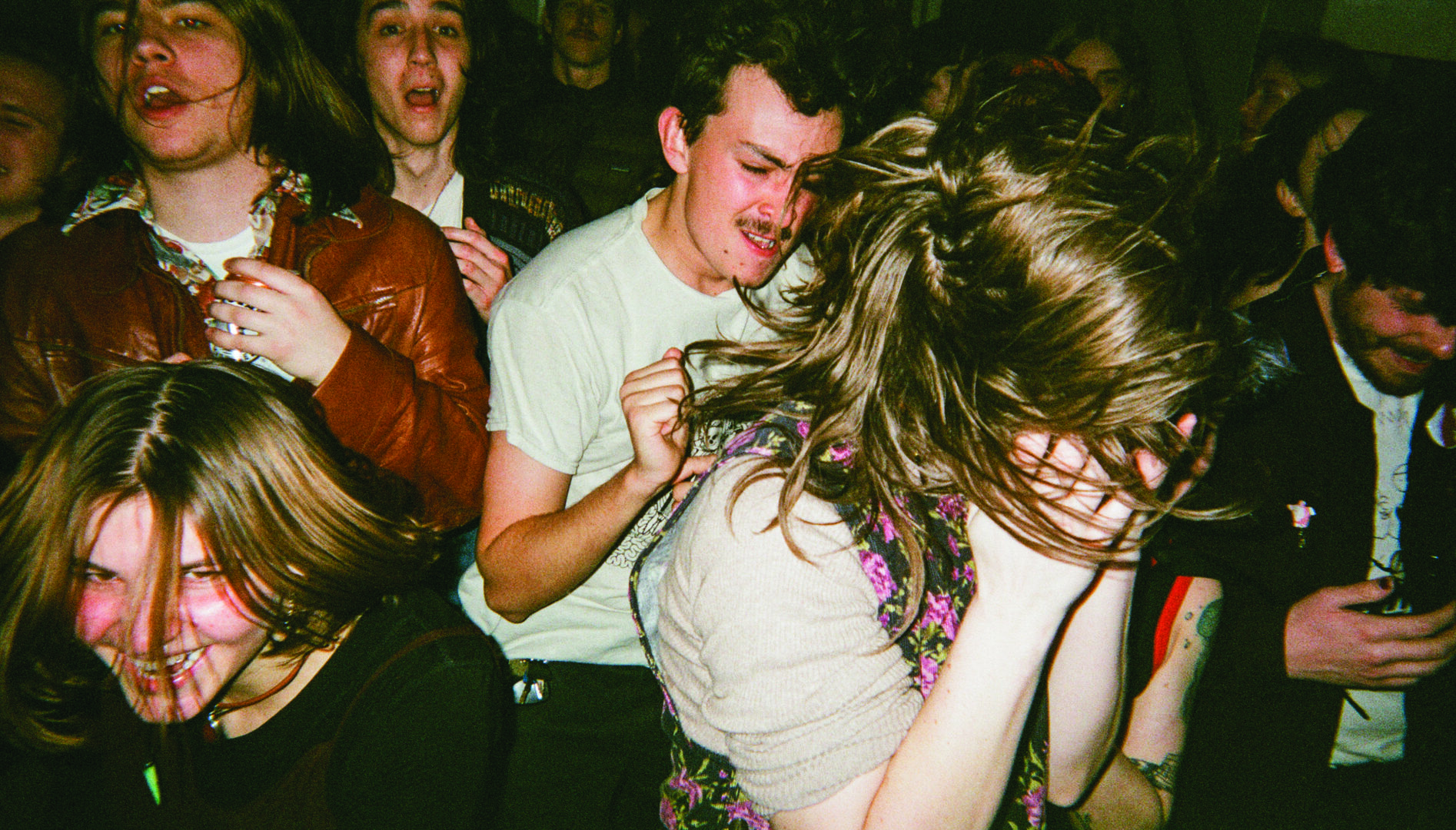 Photo of a group of young people dancing.