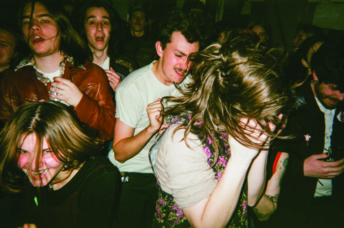 Photo of a group of young people dancing.