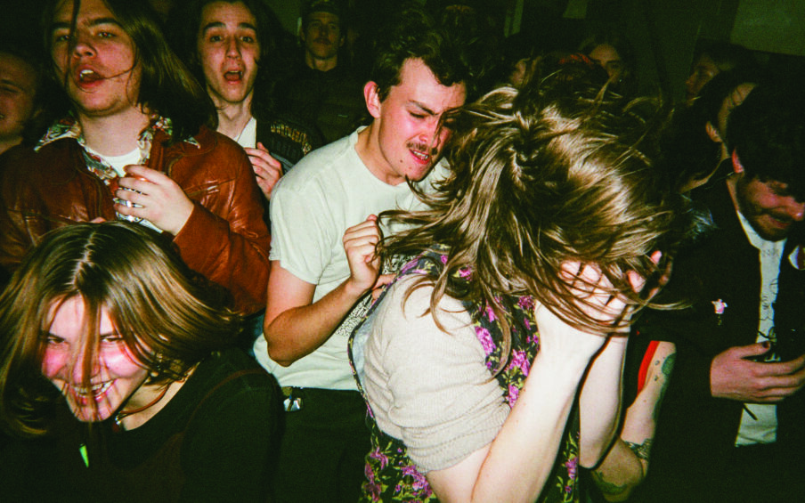 Photo of a group of young people dancing.