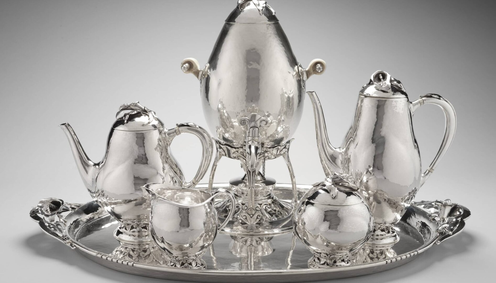 A silver coffee and tea set.