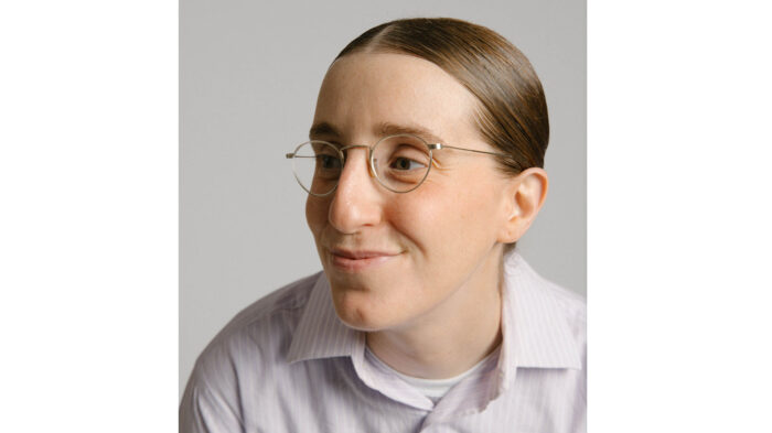 Close up photo of comedian Robby Hoffman