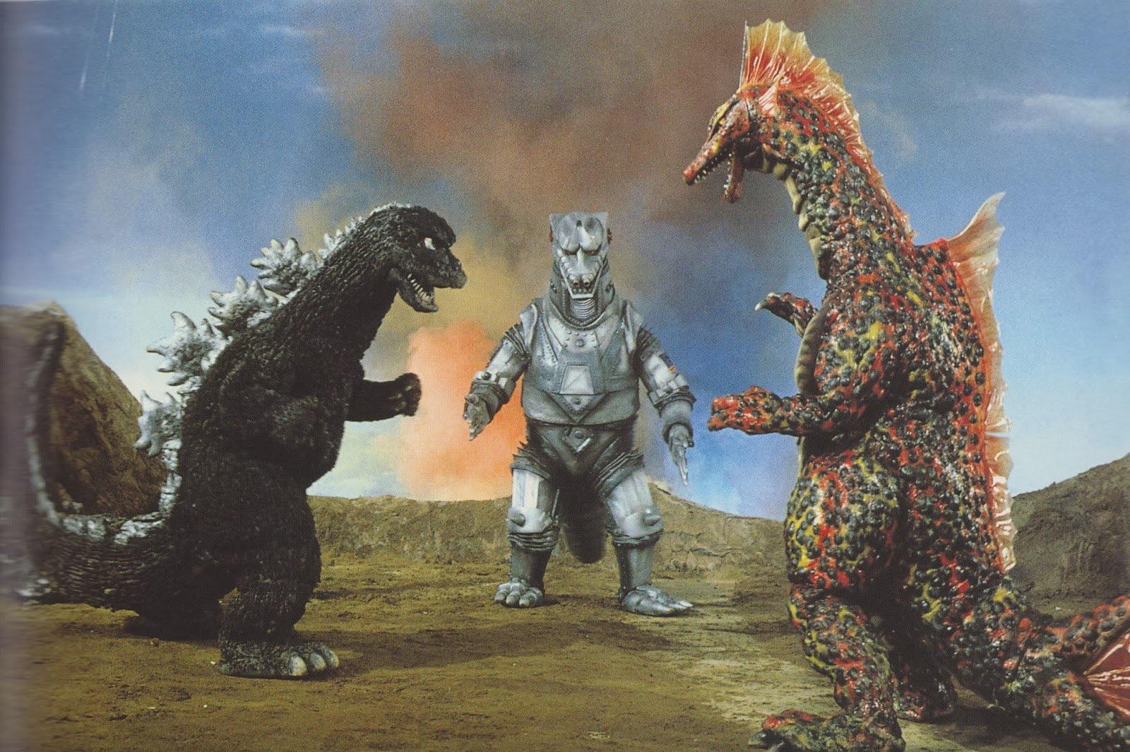 Film still of three kaiju Japanese monsters