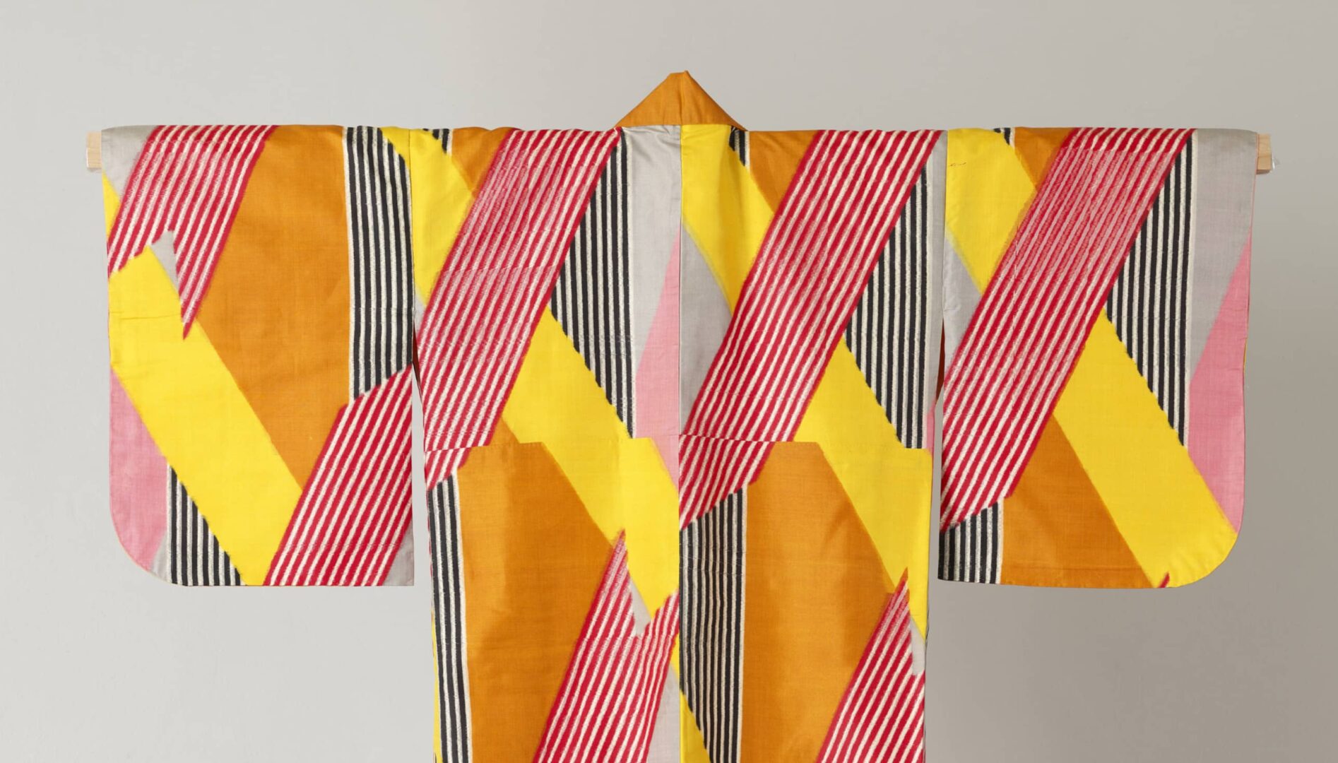 Red, orange, yellow and black kimono.