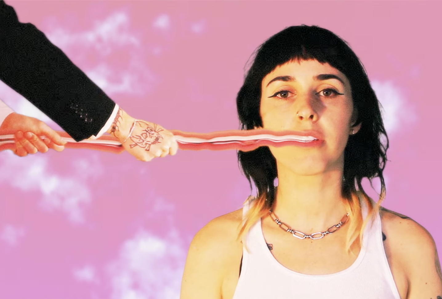 Image of a woman with a line of fire coming out of her mouth