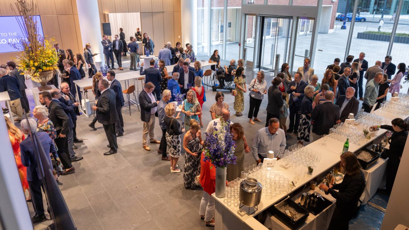 A large foyer with lots of people.
