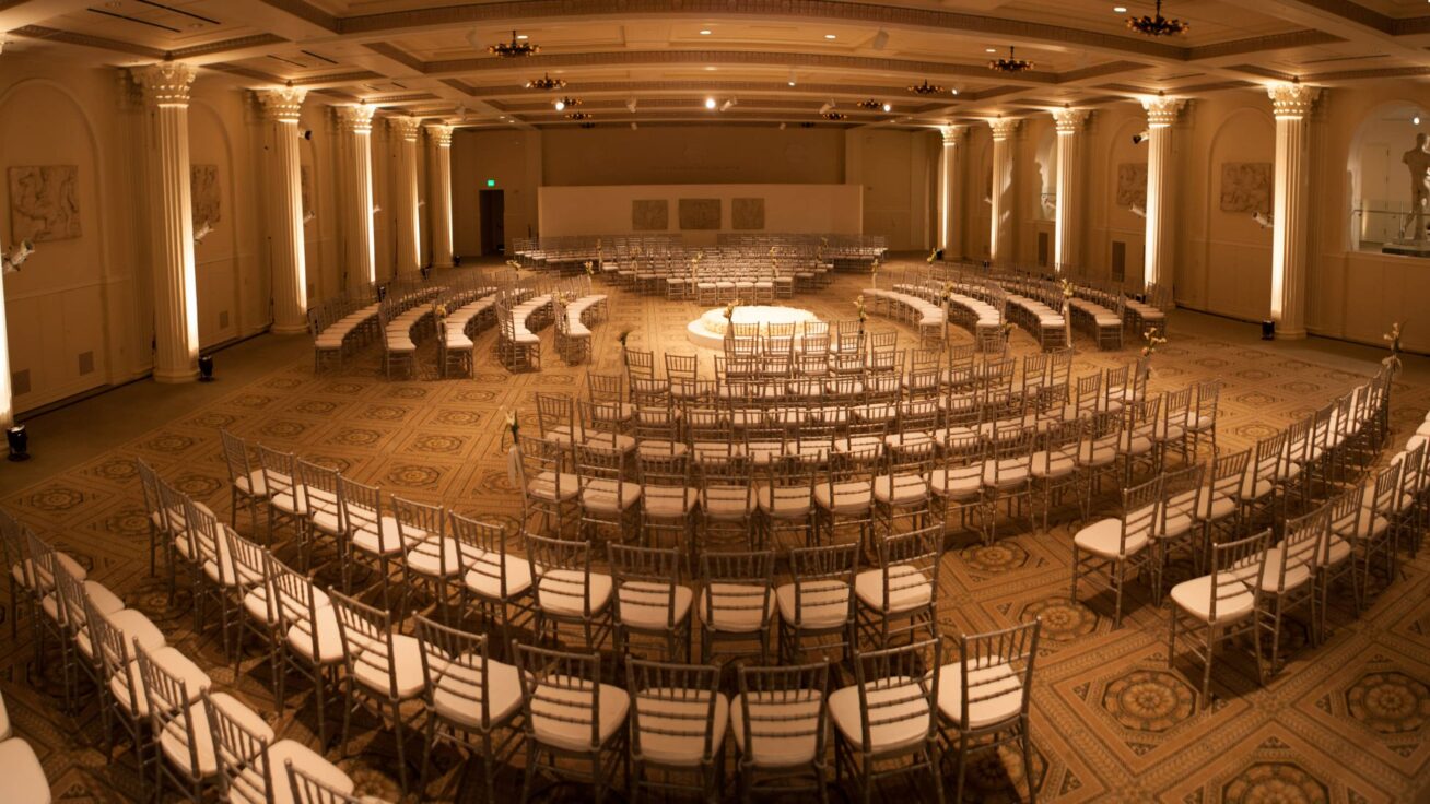 Large ballroom with multiple seating arrangements.