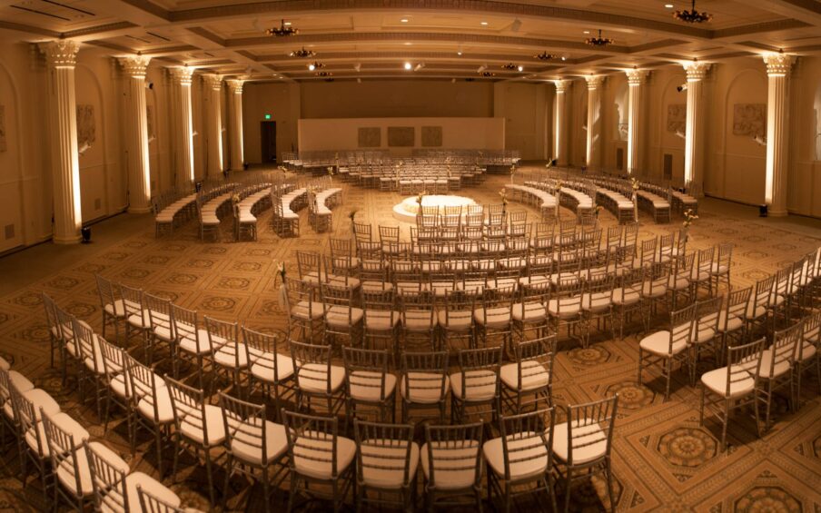 Large ballroom with multiple seating arrangements.