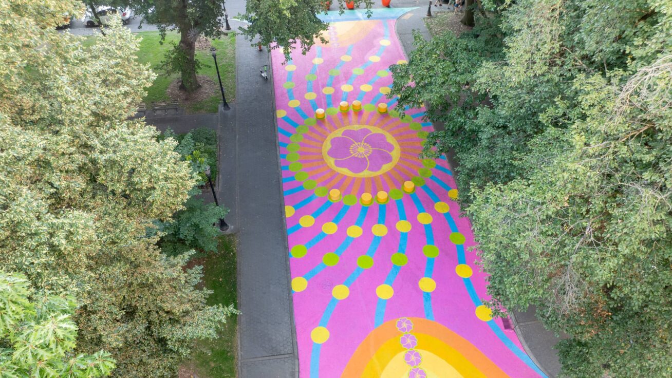 Colorful mural on a walking path.