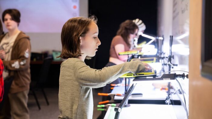 Young people working with animation equipment.
