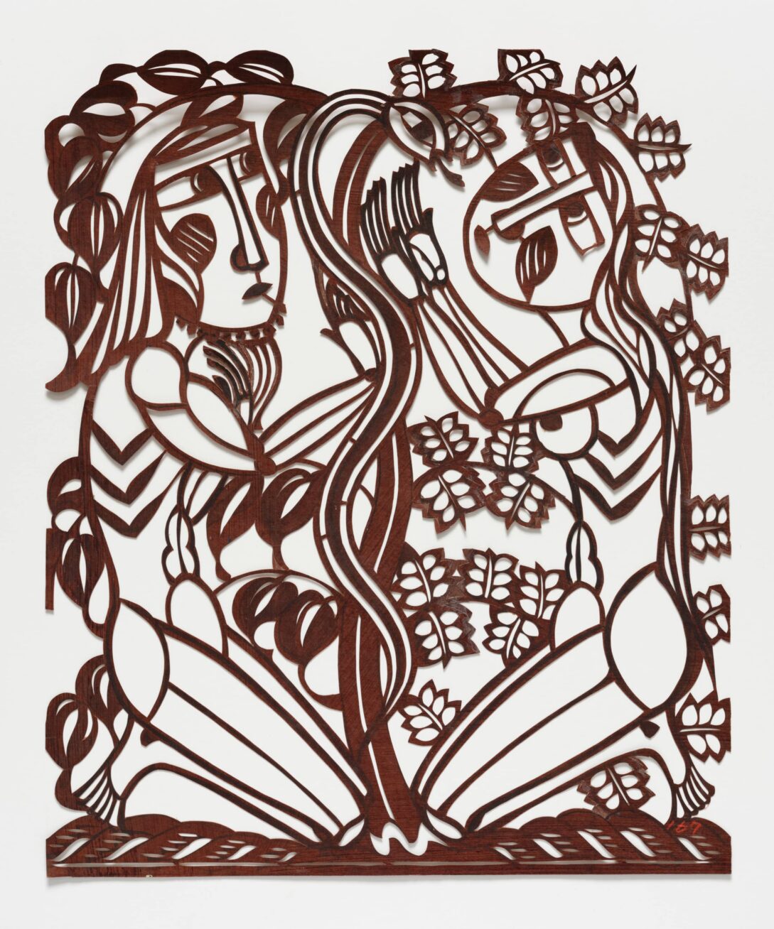 Stencil of two figures entwined in  leaves.